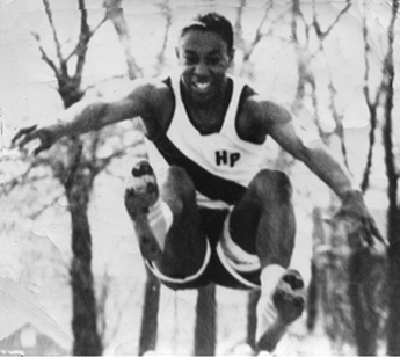 Photo of Clifford Larkins, long jumping, HPHS, junior year, 1966